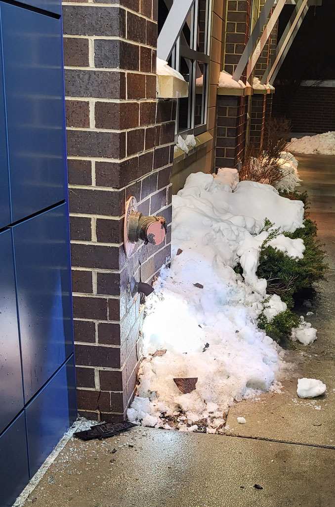 Side view of brick damage near the Automatic Sprinkler connection for the fire department at Culver's in Arlington Heights, Monday evening January 22, 2024 (PHOTO CREDIT: Chris Kobler)