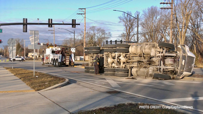 Scene of a rollover semi-trailer dump truck crash at Weiland Road and Aptakisic Road in Buffalo Grove, Thursday, January 4, 2024 (PHOTO CREDIT: Craig/CapturedNews)