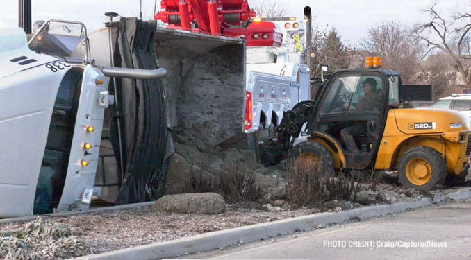 Removal of dumped lot to another semi-trailer dump truck at Weiland Road and Aptakisic Road in Buffalo Grove, Thursday, January 4, 2024 (PHOTO CREDIT: Craig/CapturedNews)