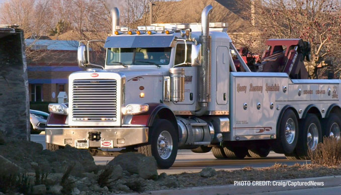 Scene of a rollover semi-trailer dump truck crash at Weiland Road and Aptakisic Road in Buffalo Grove, Thursday, January 4, 2024 (PHOTO CREDIT: Craig/CapturedNews)