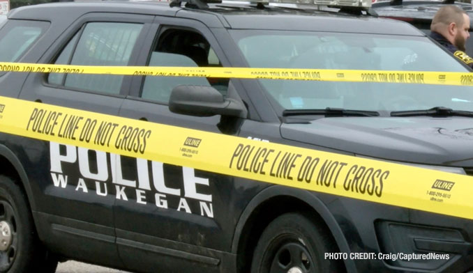 Waukegan police investigating a scene where a female struck a police officer while she was allegedly driving a stolen vehicle and allegedly under the influence of drugs with a passenger that tried to flee on foot (PHOTO CREDIT: Craig/CapturedNews).