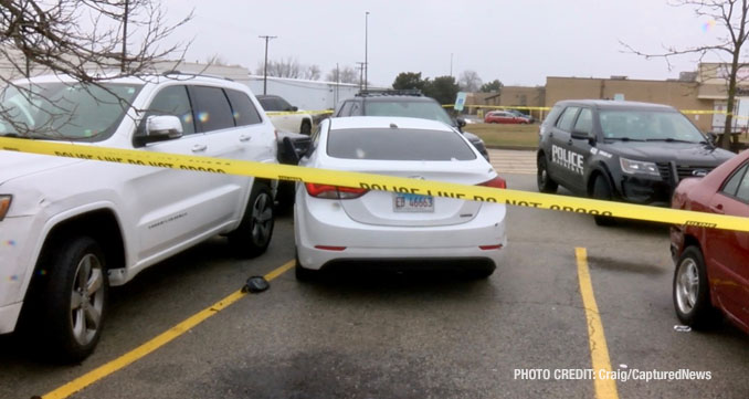 Waukegan police investigating a scene where a female struck a police officer while she was allegedly driving a stolen vehicle and allegedly under the influence of drugs with a passenger that tried to flee on foot (PHOTO CREDIT: Craig/CapturedNews).