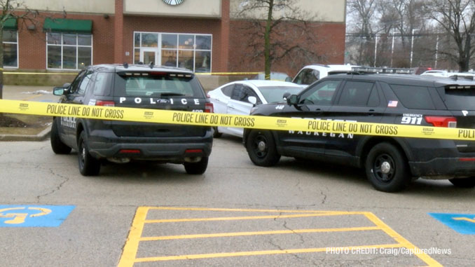 Waukegan police investigating a scene where a female struck a police officer while she was allegedly driving a stolen vehicle and allegedly under the influence of drugs with a passenger that tried to flee on foot (PHOTO CREDIT: Craig/CapturedNews)