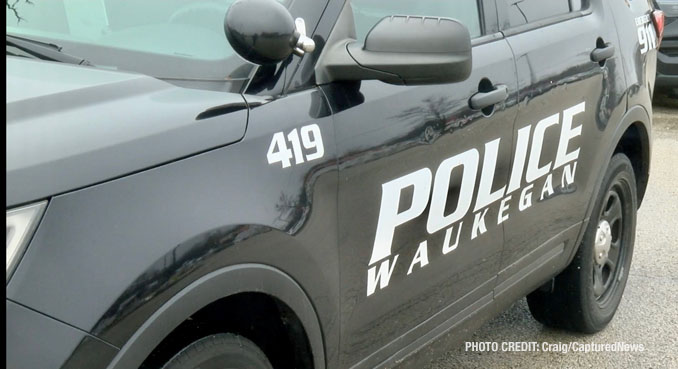 Waukegan police investigating a scene where a female struck a police officer while she was allegedly driving a stolen vehicle and allegedly under the influence of drugs with a passenger that tried to flee on foot (PHOTO CREDIT: Craig/CapturedNews)