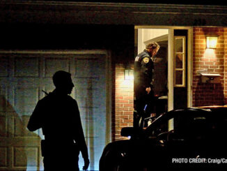 Police officers from Barrington enter a second townhouse unit, part of a stabbing investigation Monday night, February 19, 2024 on Walton Street in Barrington (Craig/CapturedNews)
