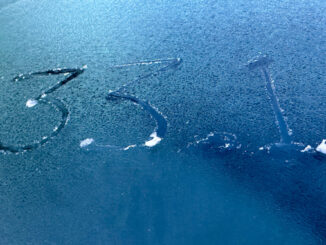 Frosty windshield with an air temperature reading of 33.1°F in central Arlington Heights (CARDINAL NEWS)