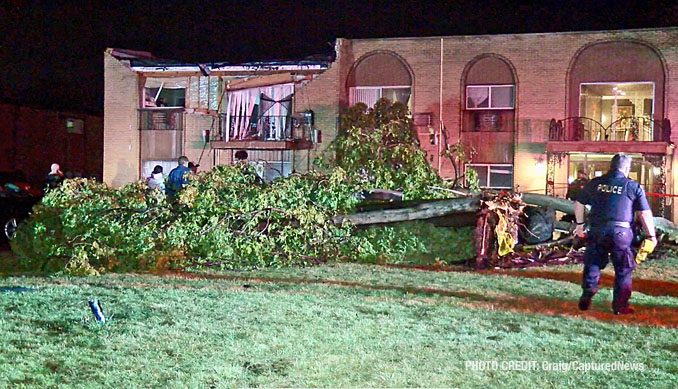 Partial roof and wall collapse and a tree down at Washington Apartments in Mundelein in storm damage Tuesday, February 27, 2024 (Craig/CapturedNews)