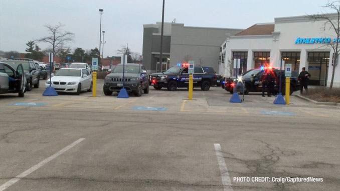 Several Vernon Hills police SUVs near the stolen white BMW 328i in Vernon Hills on Saturday, February 3, 2024 (Craig/CapturedNews)