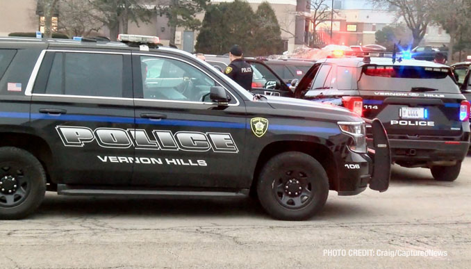 Several Vernon Hills police SUVs near the stolen white BMW 328i in Vernon Hills on Saturday, February 3, 2024 (Craig/CapturedNews)