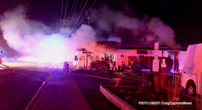 Firefighters working at the scene of an extra-alarm fire at Joseph's Florist on Milwaukee Avenue in Libertyville on Tuesday night, February 6, 2024 (Craig/CapturedNews)