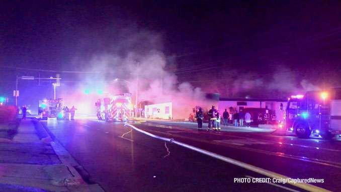 Firefighters working at the scene of an extra-alarm fire at Joseph's Florist on Milwaukee Avenue in Libertyville on Tuesday night, February 6, 2024 (Craig/CapturedNews).