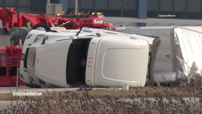 Rollover semi-trailer truck crash on I-90 WEST ramp to Arlington Heights Road on Wednesday, February 21, 2024 (CARDINAL NEWS)