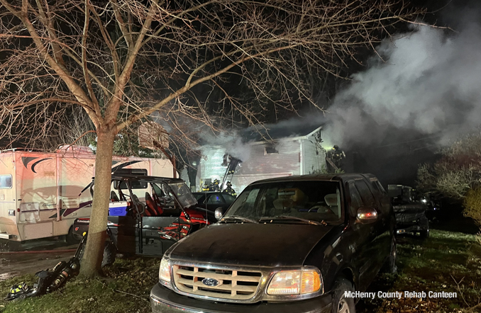 Scene from the front yard of a fatal house fire on Magellan Drive in unincorporated McHenry early morning Wednesday, March 27, 2024 (SOURCE: McHenry County Rehab Canteen)