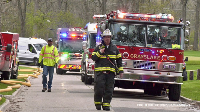 Mutual aid firefighters and Peoples Gas crew on the scene of a house fire on Sunday, April 29, 2024 (Craig/CapturedNews)