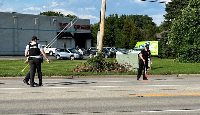 Early work by investigators at the scene of a head-on crash in the southbound lanes of Rand Road (US-12 EAST) in Prospect Heights, Monday, July 8, 2024 (CARDINAL NEWS)