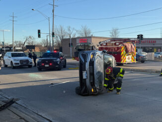 Firefighters, paramedics, and police officers on scene of a rollover crash on Rand Road just east of Arlington Heights Road on Wednesday, January 29, 2025 (CARDINAL NEWS)