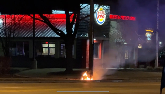 Fire at the base of a wood utility pole near Burger King, 675 East Rand Road Arlington Heights early Thursday morning, January 30, 2025 (CARDINAL NEWS)