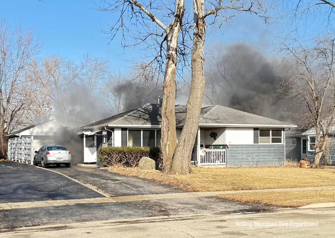 House fire on Bluebird Lane in Rolling Meadows just before firefighters arrived on Thursday, February 6, 2025 (SOURCE: Rolling Meadows Fire Department)