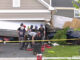 Fire department technical rescue and stabilization experts at the scene of a car crash into a garage on Kessler Drive in Mundelein, Saturday evening, July 19, 2025 (Craig/CapturedNews)