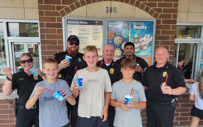 Teens, along with the Wauconda Police Department celebrated the successful securing of a handgun near Route 12 and Route 176 in Wauconda (SOURCE: Wauconda Police Department)