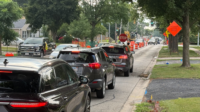 Traffic on eastbound Euclid Avenue was temporarily stopped while a construction worker used a movable stop sign at 7:51 a.m. Monday, August 11, 2025 (CARDINAL NEWS)
