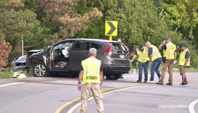 Investigators at the scene of fatal crash after the driver of the Honda CR-V crossed the double yellow line and hit the Honda Accord on Saturday, August 9, 2025 about 4:37 p.m. (Craig/CapturedNews)