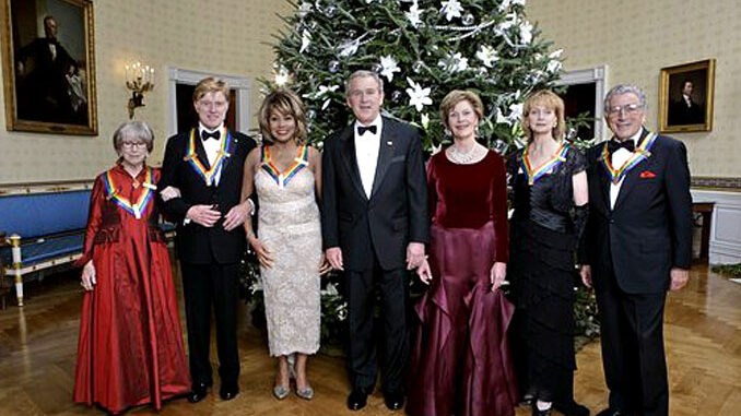 U.S. President George W. Bush and First Lady Laura Bush pose with the Kennedy Center honorees (L-R), actress Julie Harris, actor Robert Redford, singer Tina Turner, ballet dancer Suzanne Farrell and singer Tony Bennett on December 4, 2005, at a reception in the Blue Room at the White House (White House photo by Eric Draper - whitehouse.gov)