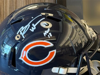 Chicago Bears helmet autographed by Brian Urlacher at an auction in Arlington Heights (CARDINAL NEWS)