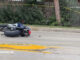 Crashed motorcycle with no license plate on Buffalo Grove Road just north of Darryl Lane; initially it was unknown whether the motorcyclist was traveling with a legally displayed license (CARDINAL NEWS)