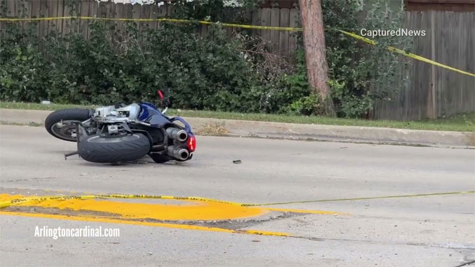 Crashed motorcycle with no license plate on Buffalo Grove Road just north of Darryl Lane; initially it was unknown whether the motorcyclist was traveling with a legally displayed license (CARDINAL NEWS)