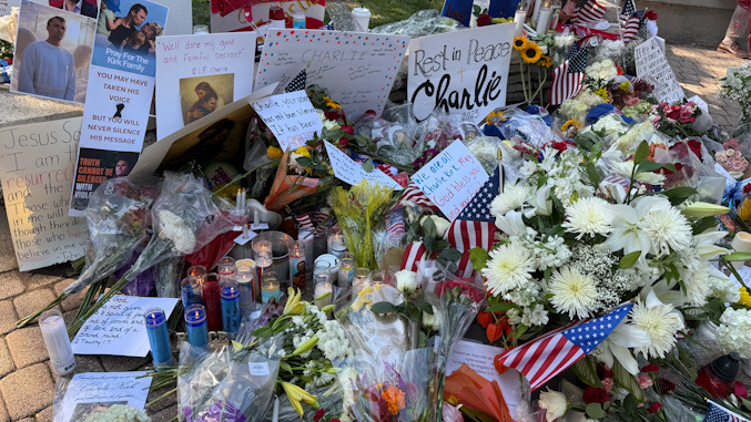 Flowers and candles at the Charlie Kirk vigil at North School Park in Arlington Heights on Sunday, September 14, 2025 (CARDINAL NEWS)