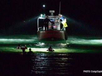 Wilmette Fire Department rescue boat and divers in the waters of Lake Michigan near Light House Beach, Saturday night, September 13, 2025 (PHOTO: Craig/CapturedNews)