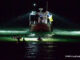 Wilmette Fire Department rescue boat and divers in the waters of Lake Michigan near Light House Beach, Saturday night, September 13, 2025 (PHOTO: Craig/CapturedNews)