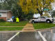 Small white cross over SUV crashed into a house at Wilke Road and Grove Street in Arlington Heights, Sunday, October 19, 2025 (SOURCE: Provided to CARDINAL NEWS via the "FASTEST/EASIEST" FORM on the CARDINAL NEWS NOTIFY PANEL)
