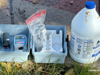 Water testing equipment and supplies at the southwest corner of Arlington Heights Road and Hawthorne Street with Arlington Heights Public Works crew (CARDINAL NEWS)