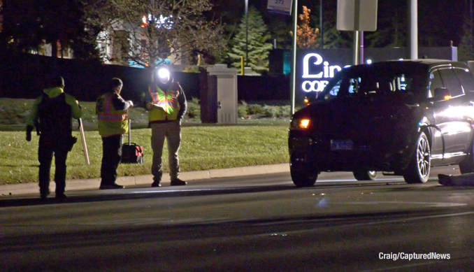 Police investigating a fatal crash scene at Milwaukee Avenue and Knightsbridge Parkway in Lincolnshire, Tuesday night, November 4, 2025