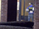 Arlington Heights police officers in the lobby of a Dana Point Condominiums building at 1515 East Central Road in Arlington Heights where two men were found dead in a utility room Friday night, November 21, 2025 (CARDINAL NEWS/CapturedNews)
