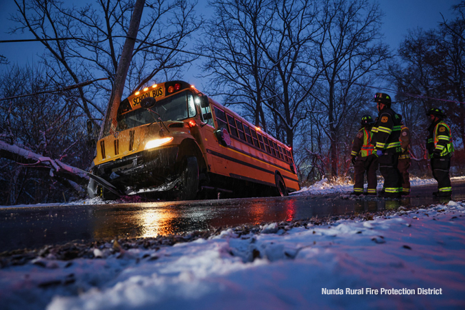 A school bus with two children aboard crashed into a pole in McHenry County Monday evening, December 1, 2025 (SOURCE: Nunda Rural Fire Protection District)