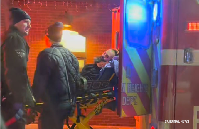 Bearded man loaded into an Arlington Heights Fire Department ambulance at the Metra train station, 45 West Northwest Highway, Arlington Heights (provided image/CARDINAL NEWS)