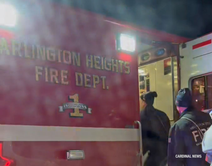Bearded man loaded into an Arlington Heights Fire Department ambulance at the Metra train station, 45 West Northwest Highway, Arlington Heights (provided image/CARDINAL NEWS)