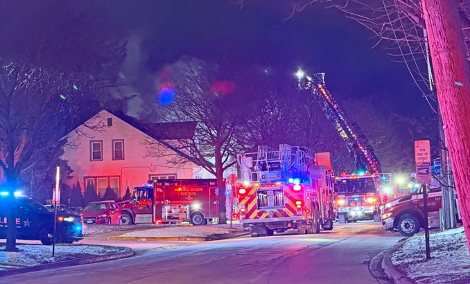 House fire on Wing Street west of Chestnut Avenue in Arlington Heights Friday night, January 2, 2026 (PHOTO CREDIT T.J. Seputis)