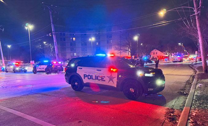 Arlington Heights police officers closed Wing Street between Chestnut Avenue and Ridge Avenue during firefighting operations (T.J. Seputis)