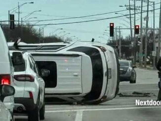 Ford Explorer rolled over on the driver's side near the left turn lane of eastbound Rand Road to northbound Arlington Heights Road with eastbound Rand Road in the background of the photo Friday, March 27, 2026 (SOURCE: Shared photo on Nextdoor)
