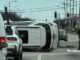 Ford Explorer rolled over on the driver's side near the left turn lane of eastbound Rand Road to northbound Arlington Heights Road with eastbound Rand Road in the background of the photo Friday, March 27, 2026 (SOURCE: Shared photo on Nextdoor)