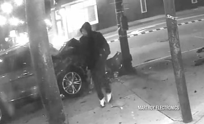 Suspected driver of a red 2015 Ford Explorer that hit and killed a bicyclist at Kedzie Avenue and 63rd Street in Chicago, and fled the scene Sunday, April 5, 2026 at about 1:08 a.m. (SOURCE: Surveillance Video Martroy Electronics)
