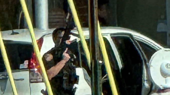 Police outside Vortex Vape Shop during a standoff on Saturday, May 9, 2026 (Provided Photo)