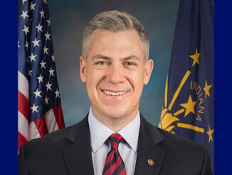 Senator Jim Banks (R-IN) and US Naval officer (official portrait)