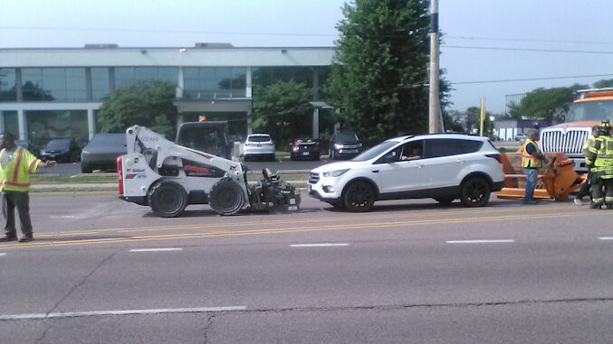 Road construction Bobcat at a crash scene on Algonquin Road near Keystone Court in Rolling Meadows on Friday morning, July 24, 2026 (CARDINAL NEWS/provided photo).