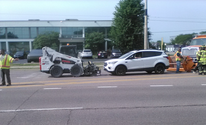 Road construction Bobcat at a crash scene on Algonquin Road near Keystone Court in Rolling Meadows on Friday morning, July 24, 2026 (CARDINAL NEWS/provided photo).