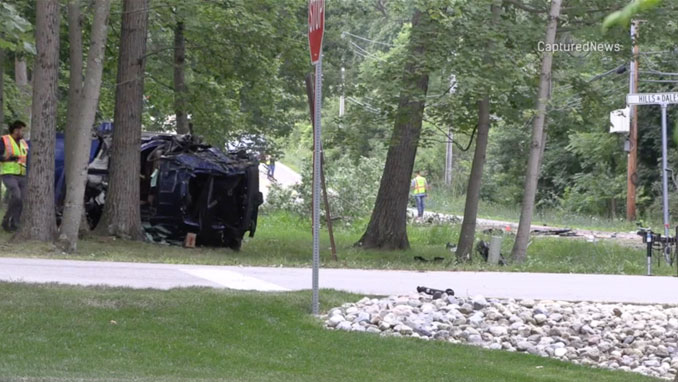 A wrecked blue Mercedes on its side off Brinker Road near Hills and Dales Road in Barrington Hills the morning after a single-vehicle crash overnight Friday/Saturday, July 25, 2026 (CapturedNews).